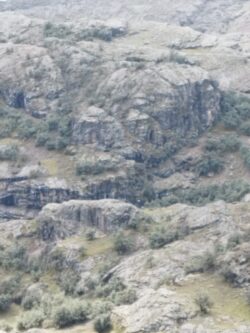 You can see the mountainside of the gold mine concession